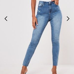 High waist distressed jean